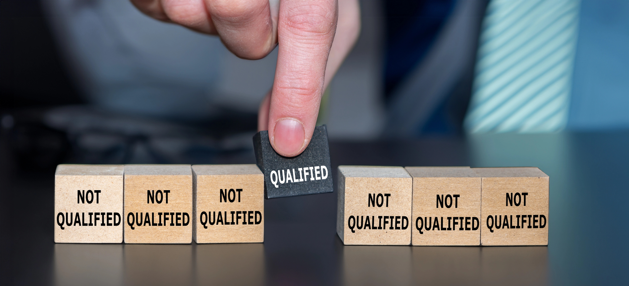 PERM Labor Certification Block with "Qualified" written on the side amongst other blocks saying "Not Qualified" representing PERM Labor Certification